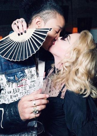 David Banda Mwale Ciccone Ritchie's mother, Madonna with her boyfriend, Ahlamalik Williams.